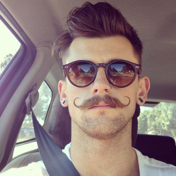 2. A curled mustache with the most genuine hipster style