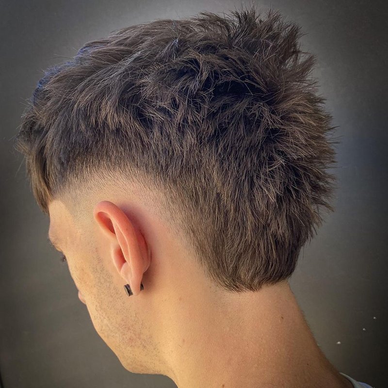 The Volume-Building High Fade Temple Haircut