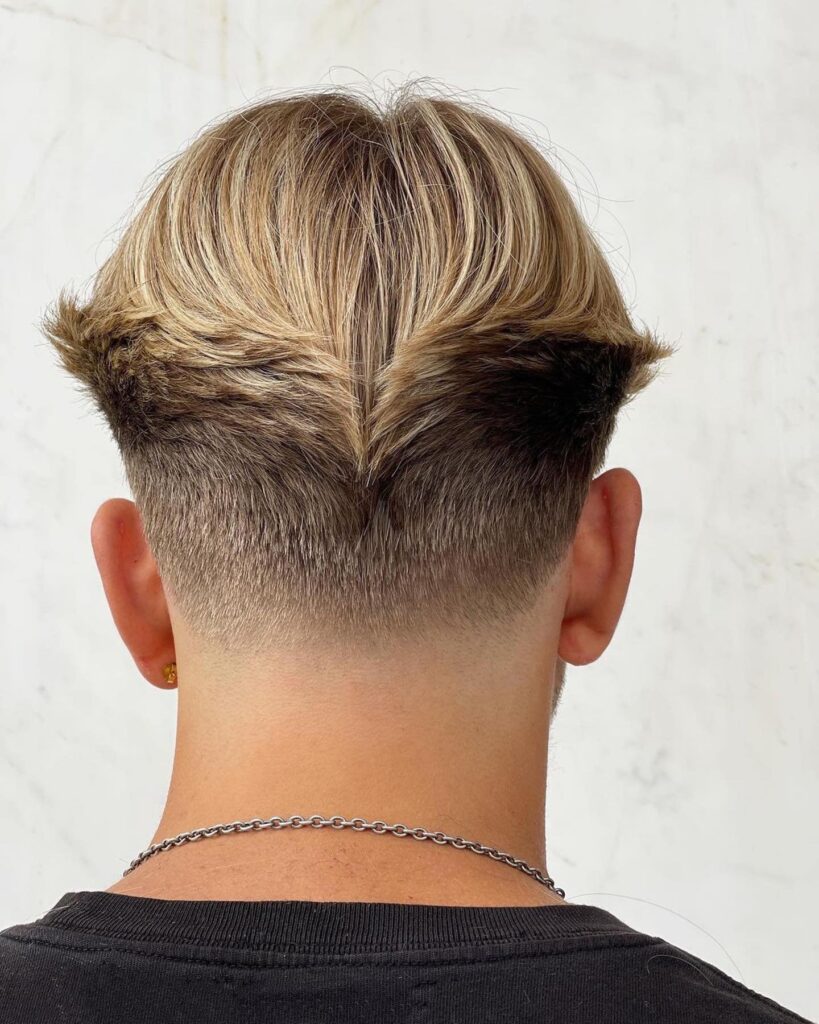 Sun Kissed Slick Back Mens Hairstyle with Highlights