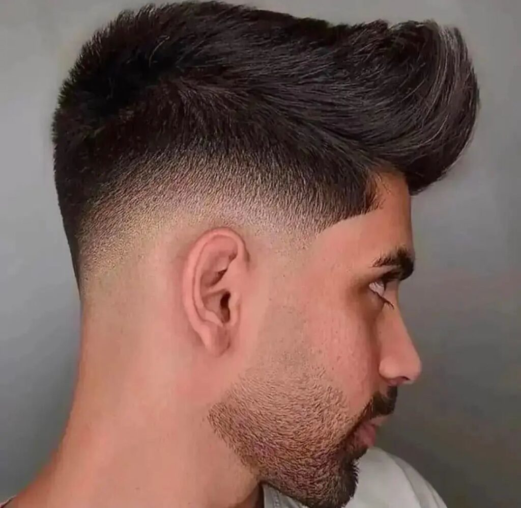 The Distinguished Quiff A Fade Haircut that Speaks Volumes of Timeless Male Elegance