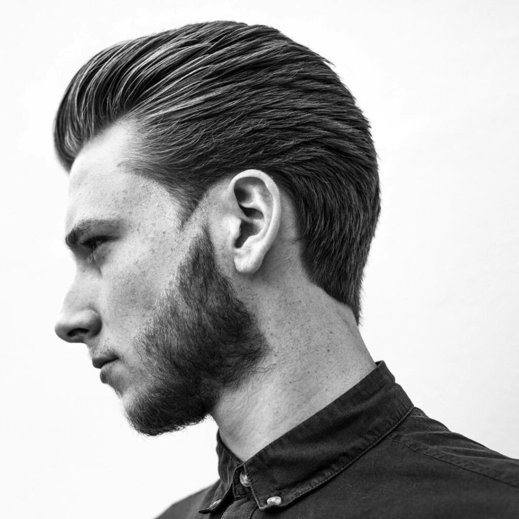 The Sculpted Slick Back with Precision Beard Fade