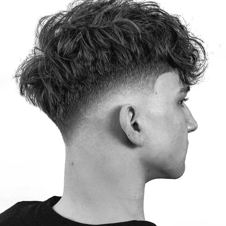 The Sharp Contrast A Burst Fade Haircut with Attitude