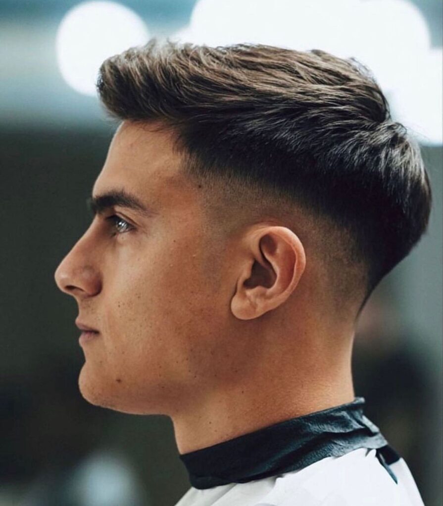 The Soft Transition Burst Fade Haircut with Elegance