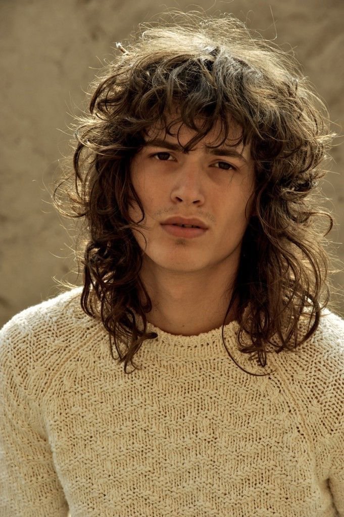 Tousled Elegance Long Curly Hairstyles with Bangs for Men